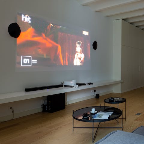 Watch a movie or play Fifa,  ForteNite or Minecraft on the widescreen projector
