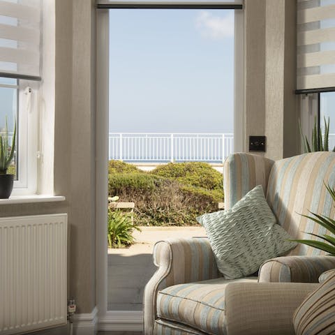 Take your morning coffee onto the communal terrace and gaze out at the ocean 