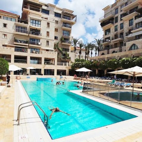 Swim and sun yourself at the hotel-style outdoor pool