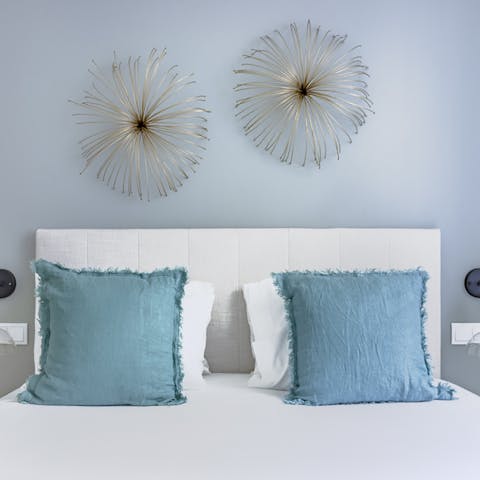 The blue hues in this bedroom