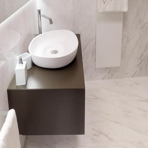 A marble-clad bathroom