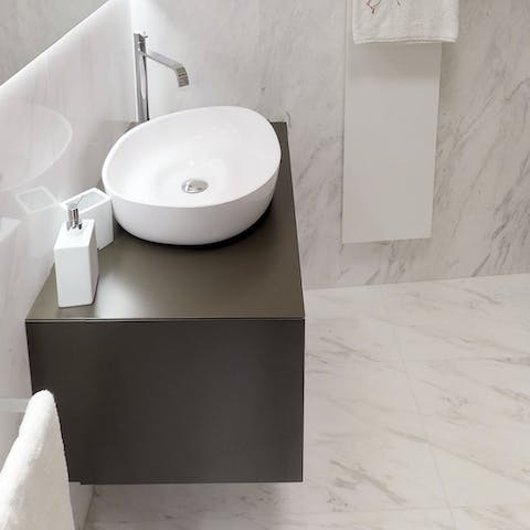 A marble-clad bathroom