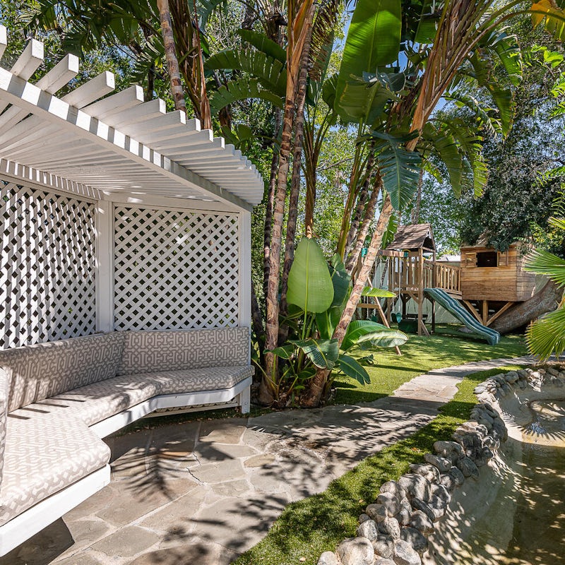 Fine yourself a quiet moment in the garden while the kids play on the jungle gym