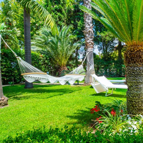 Doze in a hammock in the beautiful Mediterranean garden