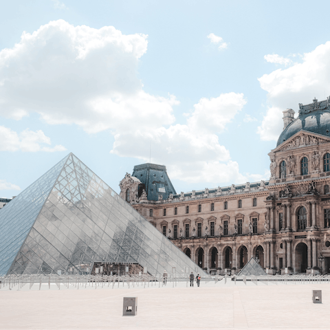 Visit the masterpieces at the Louvre, less than a ten-minute walk away