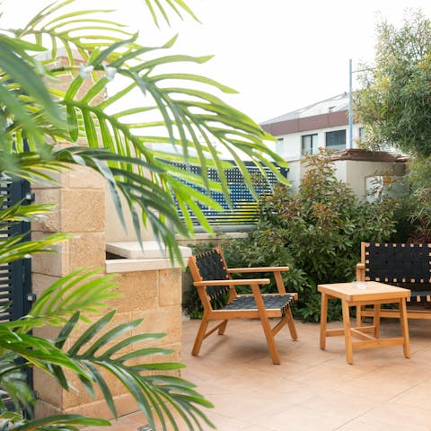 Relax in your private outside space after a day at the beach