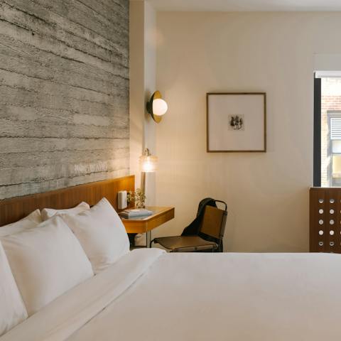 Drift off in the comfortable bed after a day of work on play in the city