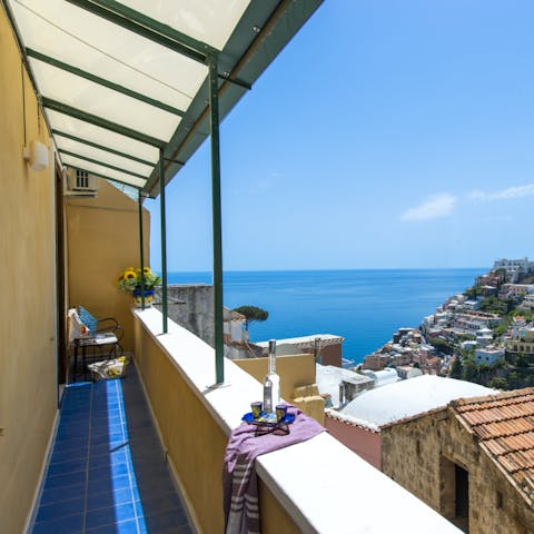 Sit on the private balcony and take in the views of the Amalfi Coast