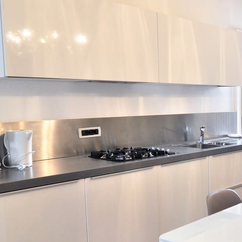 The stainless steel kitchen surface