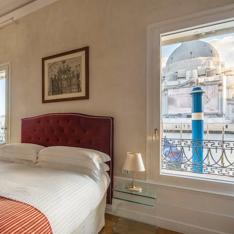 Admire the Basilica della Salute from the main bedroom