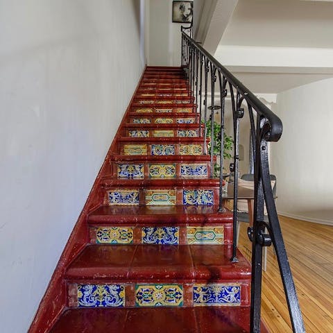 Admire the Spanish Revival staircase
