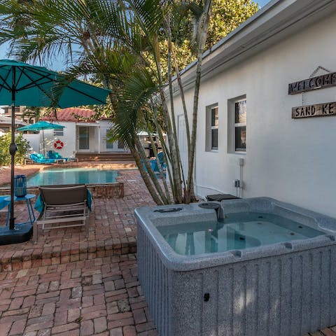 Relax in the hot tub while the kids make a splash in the pool