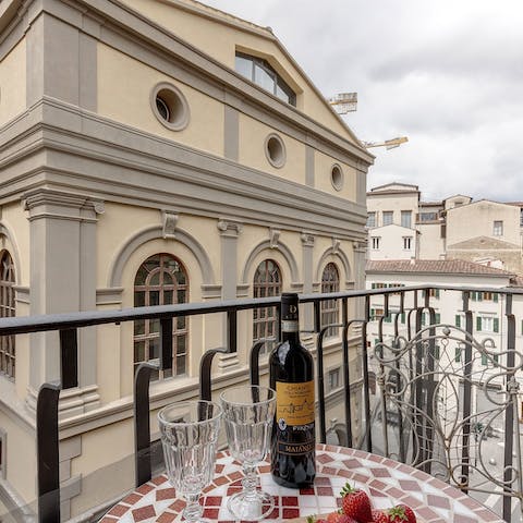 Enjoy wine and views on the balcony