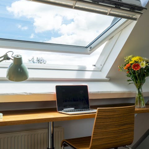 Get some work done at the breakfast bar, admiring the views