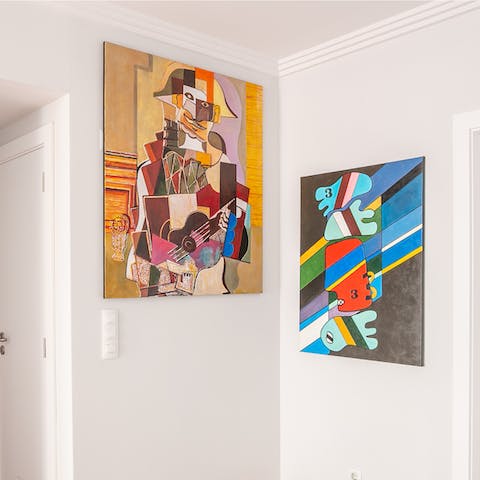 Take in the vibrant cubist artwork adorning the walls