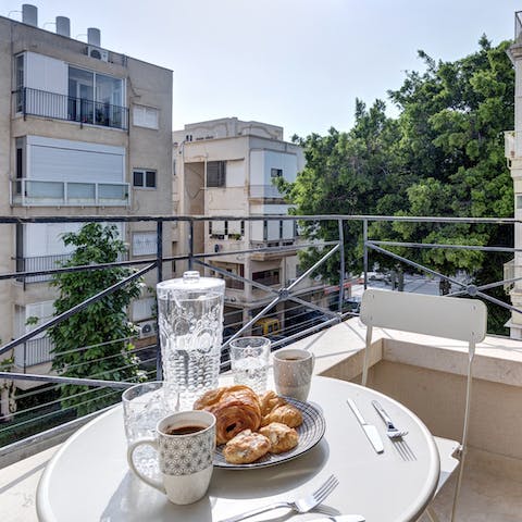 Enjoy breakfast on the balcony