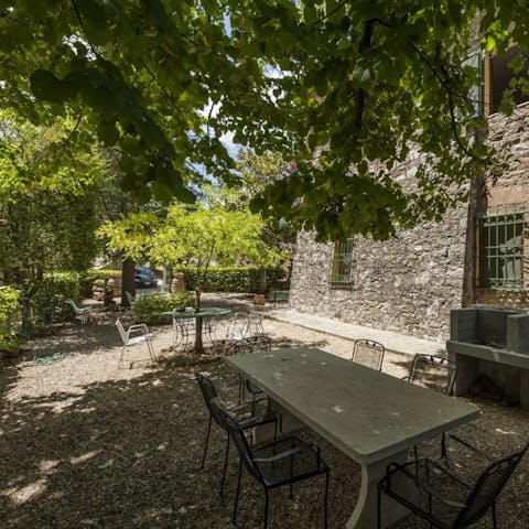 Enjoy alfresco meals, or antipasto and wine, in the shade