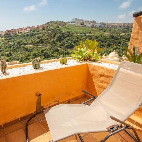 Relax in the sunshine on the comfy loungers based on your terrace