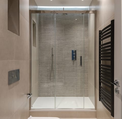 Freshen up before a night on the town with a rainfall shower