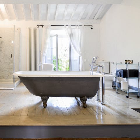 Gaze at the views while soaking in the bathtub