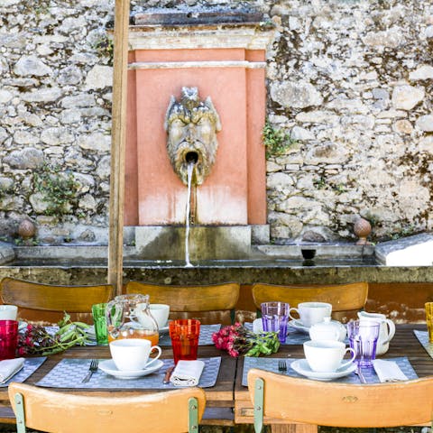 Gather friends and dine alfresco by the fountain