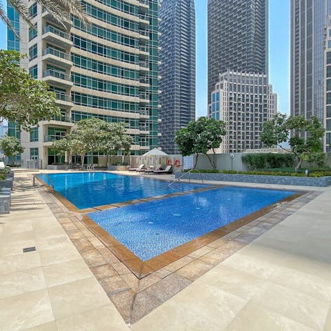 Lounge by the communal pool or cool off with a gentle swim
