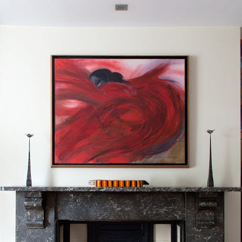 Admire the extensive collection of art throughout the home
