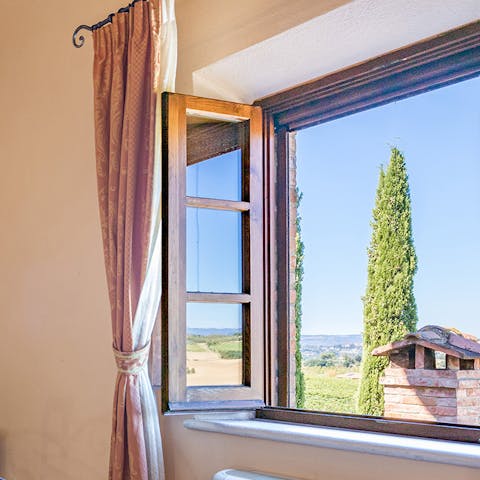 Wake up to views of rolling hillsides and vineyards