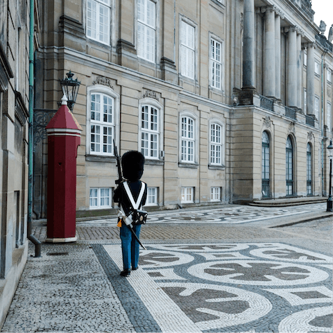 Take a tour of the nearby Amalienborg Museum