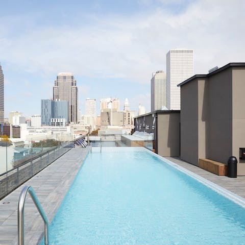 Take a dip in the rooftop pool overlooking the city