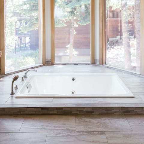 Sink into luxury in the whirlpool bath