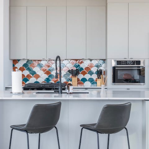 Rustle up breakfast, lunch and dinner in the sleek and modern kitchen