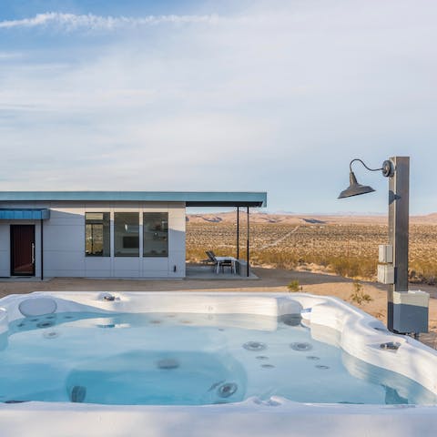 Unwind in the hot tub with incredible views