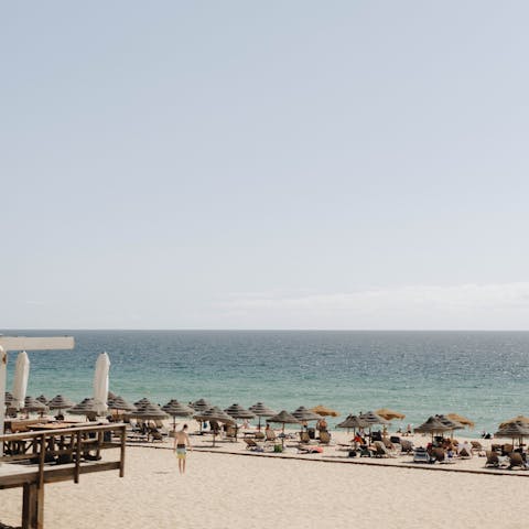 Spend your days enjoying the barefoot luxury vibes of Praia da Comporta, a short drive away