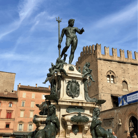 Take a seven-minute stroll to the Piazza Maggiore and Fountain of Neptune 