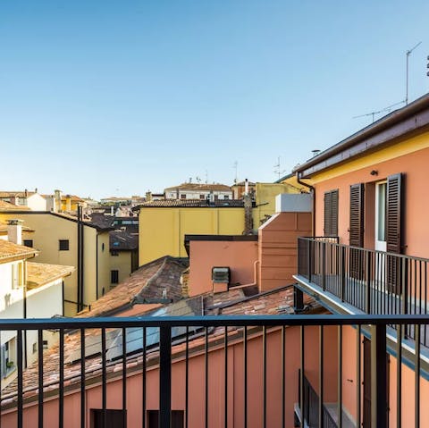 Sip espresso in the sun on your private balcony