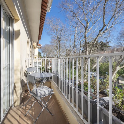 Enjoy a morning coffee out on the sunny balcony