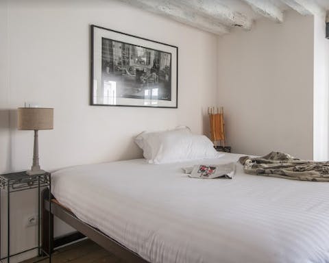 The exposed beams in the bedrooms