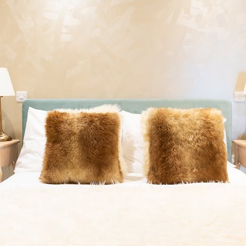 Drift off to dreamland in the fuzzy sheepskin bed