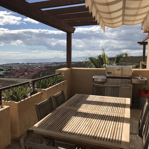 Tend to the barbecue and gaze out the sweeping view of the Med from the terrace
