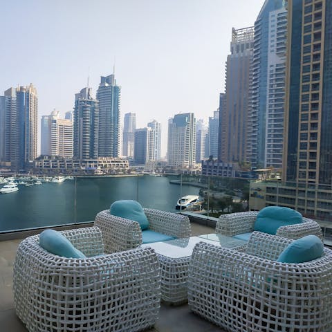 Watch the sun set over the water from the communal terrace