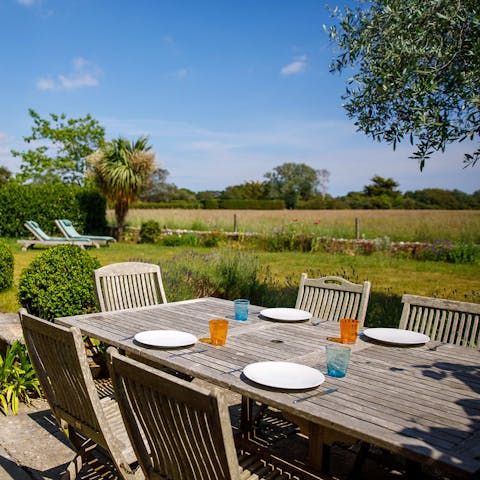 Take in the view as you dine al fresco in the garden