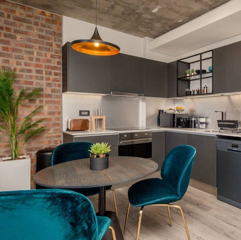 Scramble eggs and enjoy it with toast in this open kitchen and dining space