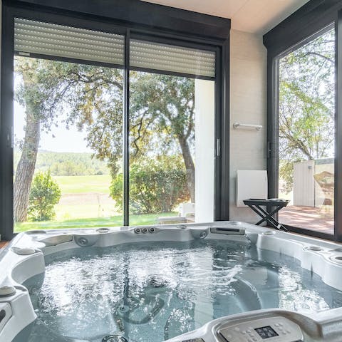 Enjoy a long and relaxing soak while admiring the views in the indoor hot tub