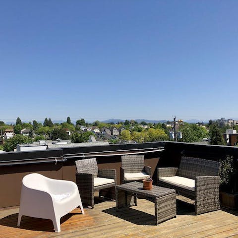 Admire the vistas over Seattle and Mt. Rainier from the private roof terrace