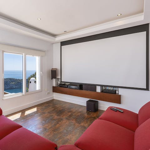 Gather for family movie nights in the cinema room
