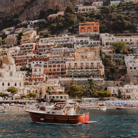 Explore Positano's colourful streets before relaxing on Fornillo Beach 