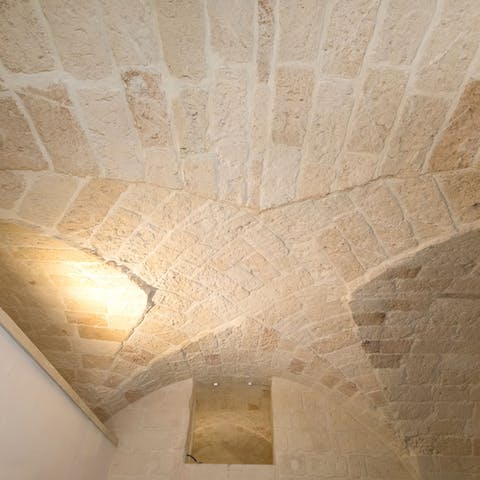 Lie back under the beautiful and historic star vault ceiling of the bedroom