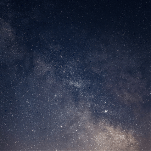 Sit outside and gaze at the night sky