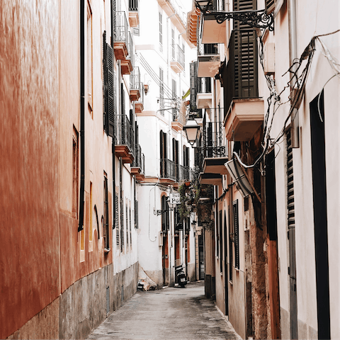 Lose yourself in the labyrinthine backstreets of the island's capital of Palma, a little over thirty minutes away